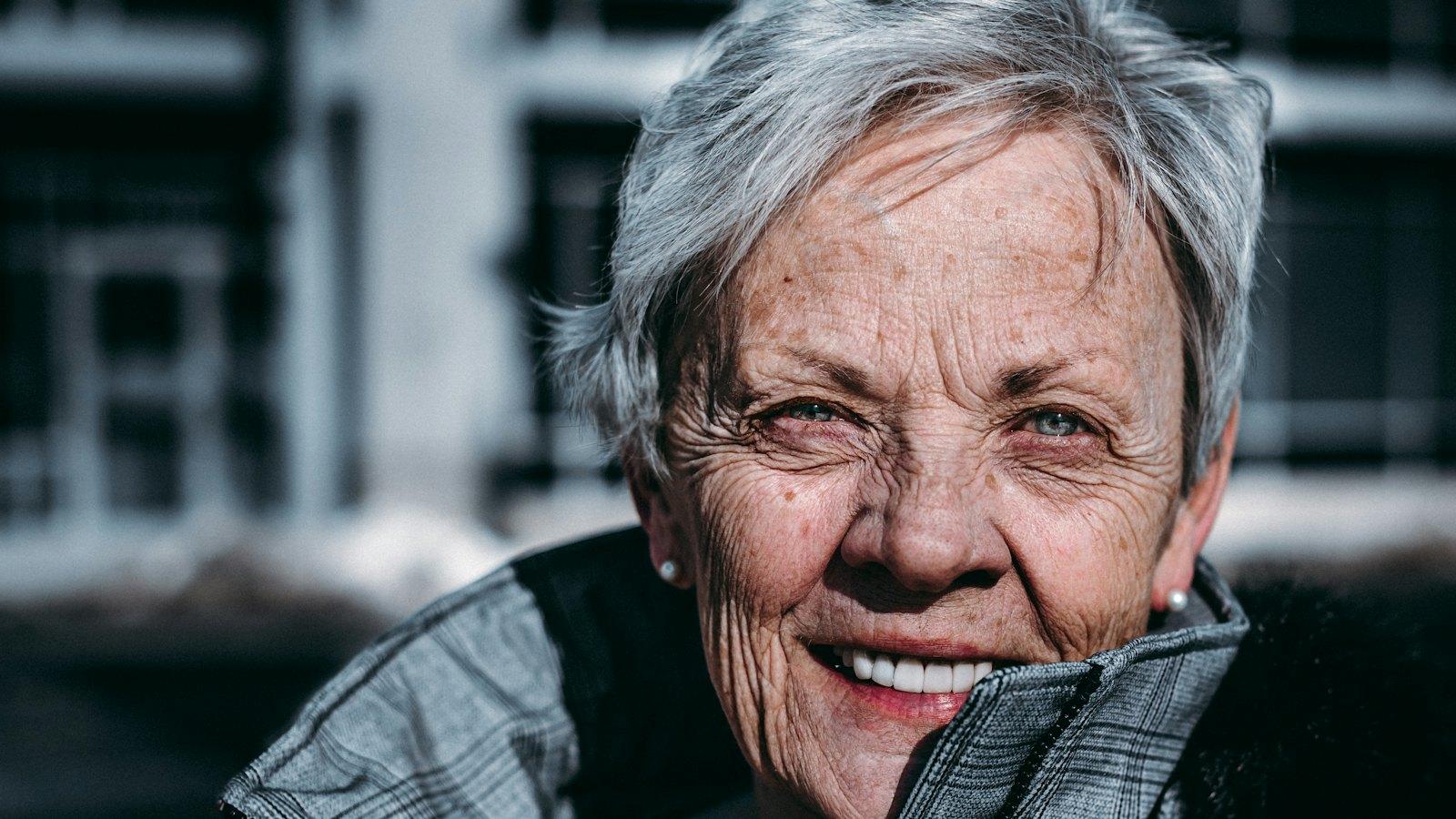 Portrait of a smiling woman in her eighties