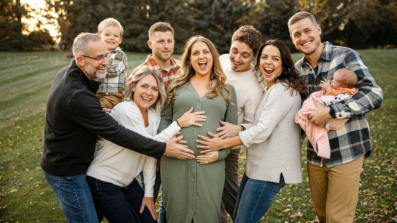 Three generations of a family gathered together outdoors