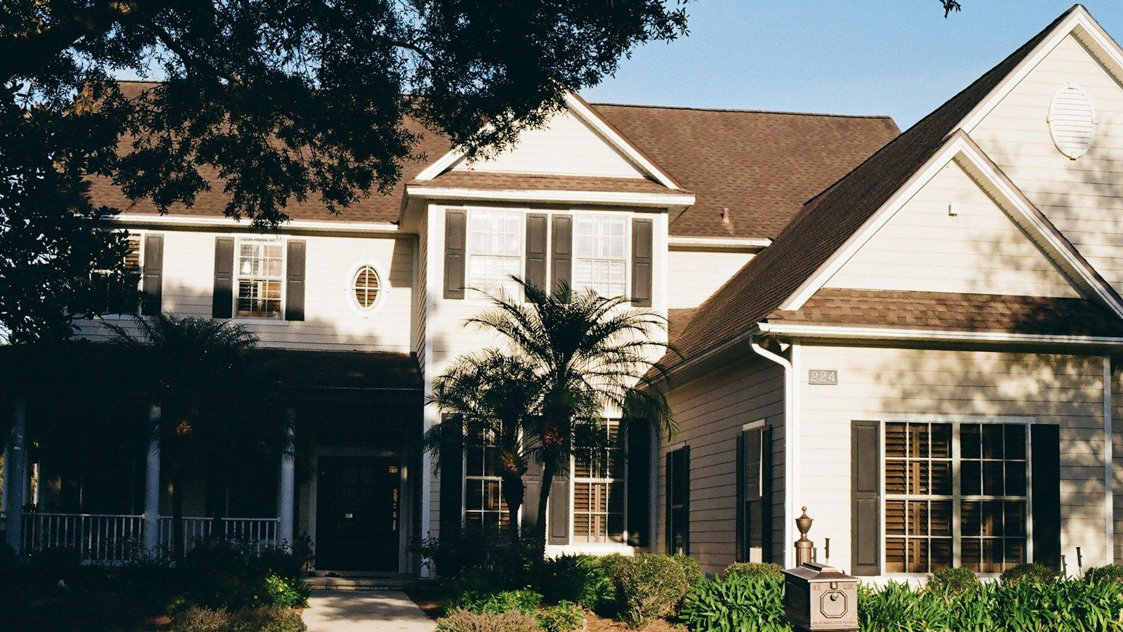 Two-story family home with a covered porch