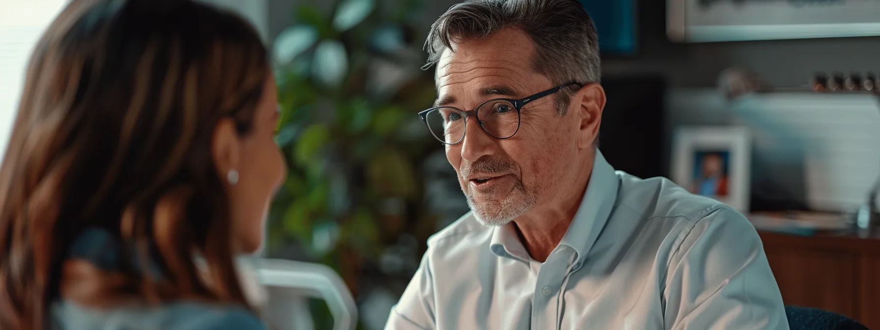 a financial advisor explaining tax advantages of indexed universal life insurance to a client.