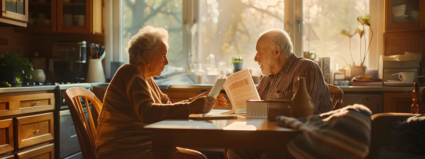 a thoughtful senior couple sitting at a kitchen table, reviewing documents and discussing their final expense insurance options with a trusted advisor.