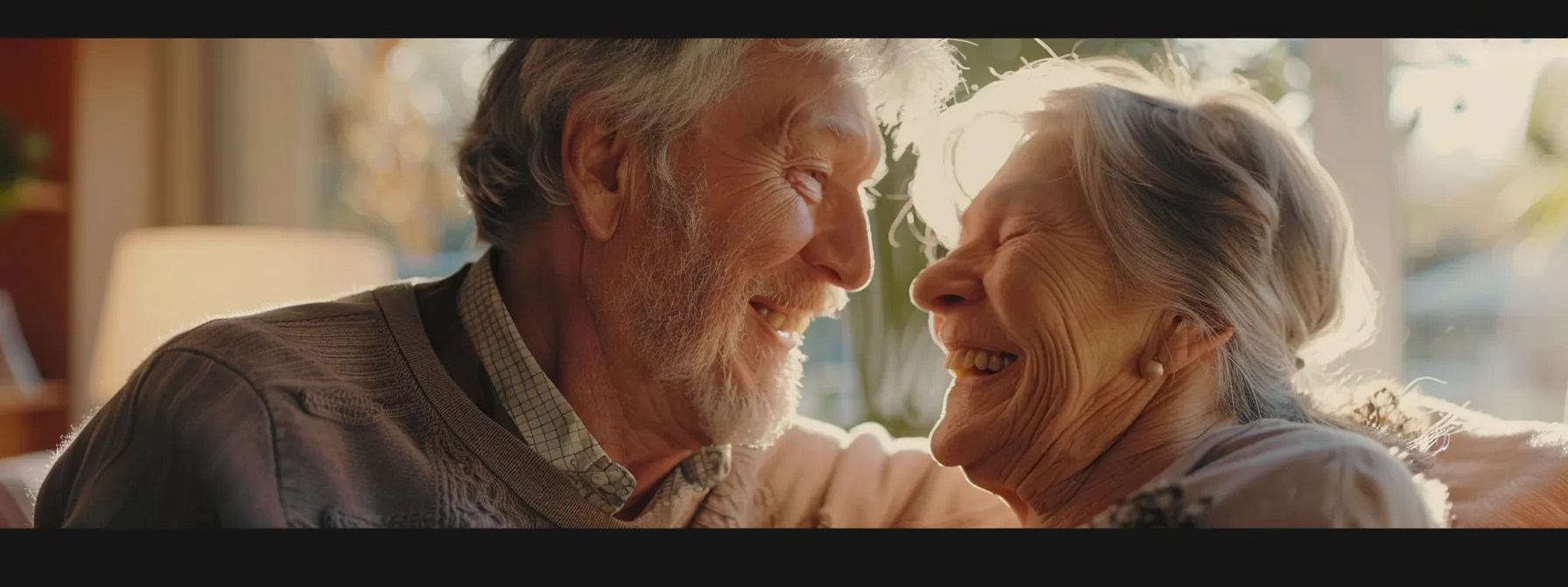 a senior couple smiling happily while receiving medical care and assistance through medicare.