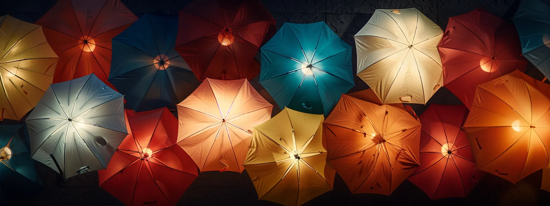 a diverse selection of colorful umbrellas representing different types of annuities, offering protection and shade while symbolizing the various options for retirement and life insurance.