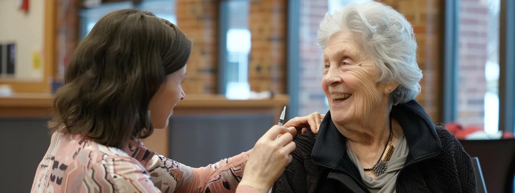 a senior receiving a free health screening and vaccination at a medicare wellness clinic.