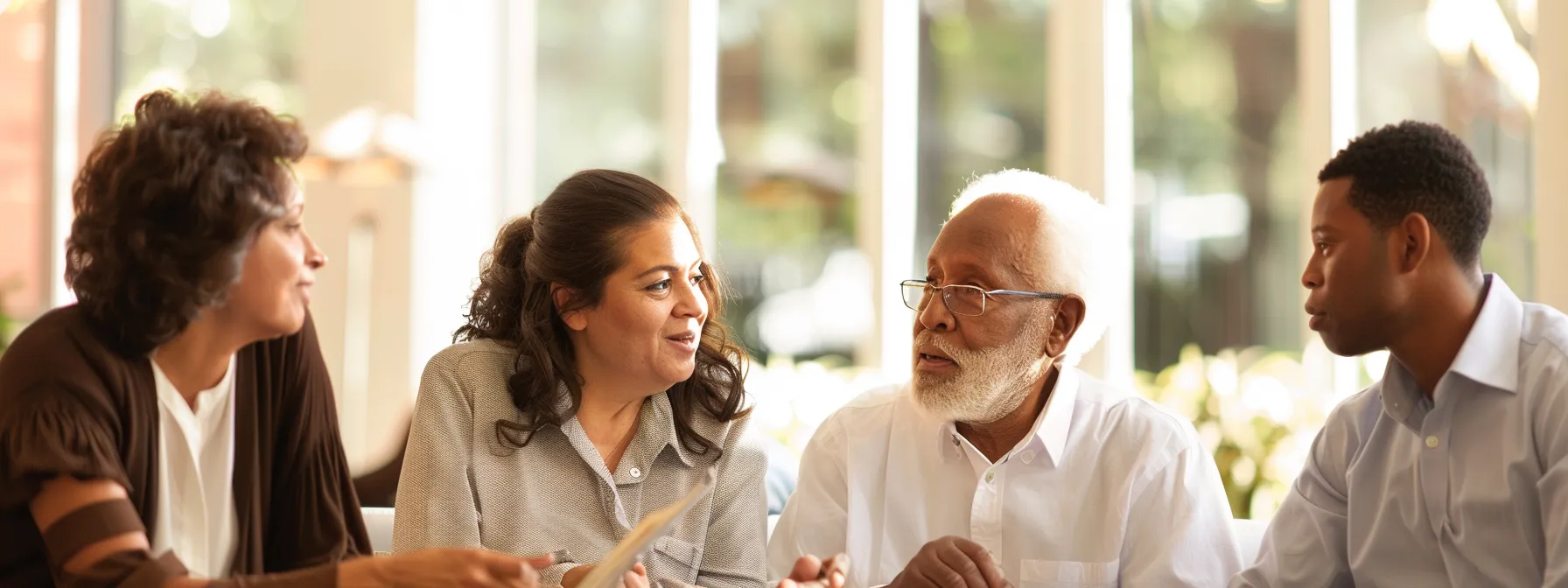 a diverse group of individuals of different ages and backgrounds discussing whole life insurance options in a modern, brightly lit office space.